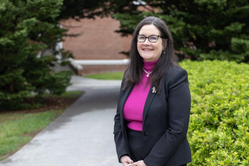 Lisa Tucker standing outside of Wallace Hall.